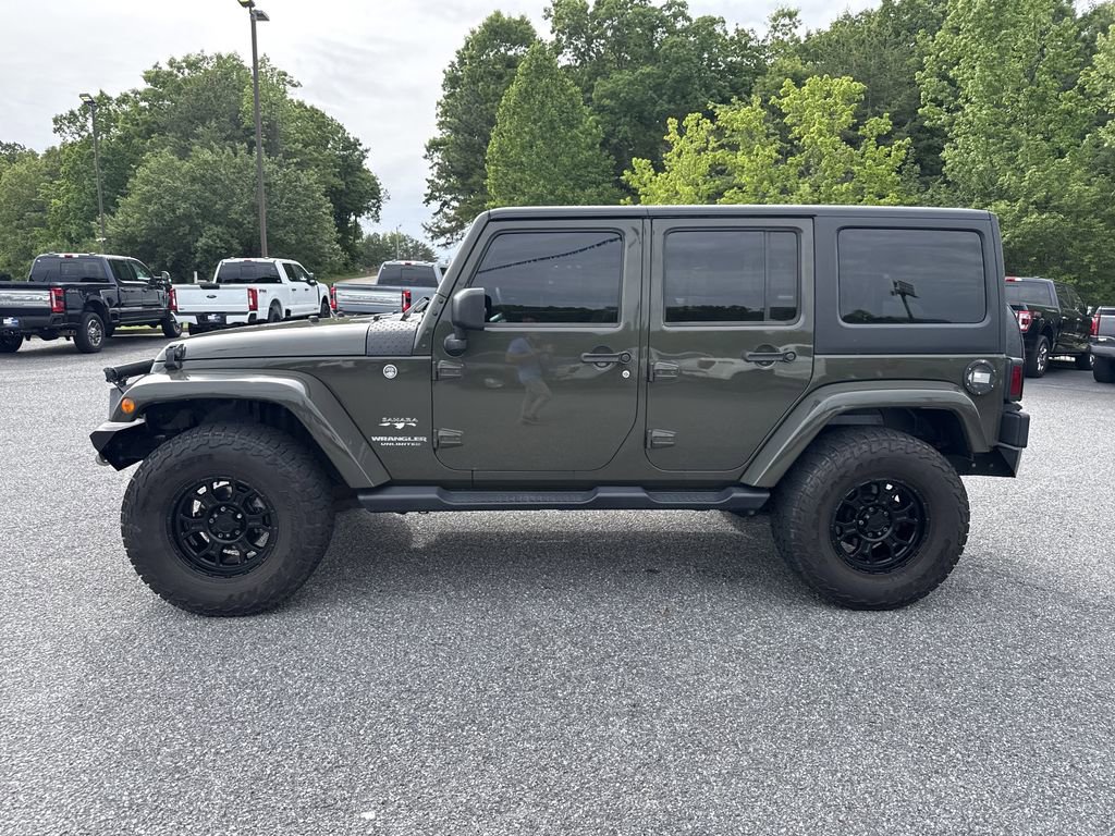 Used 2016 Jeep Wrangler Unlimited Sahara w/ Dual Top Group AWD/4WD image 4