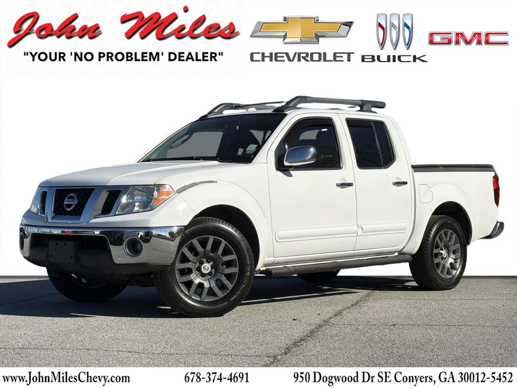 Used 2011 Nissan Frontier SL AWD/4WD image 1