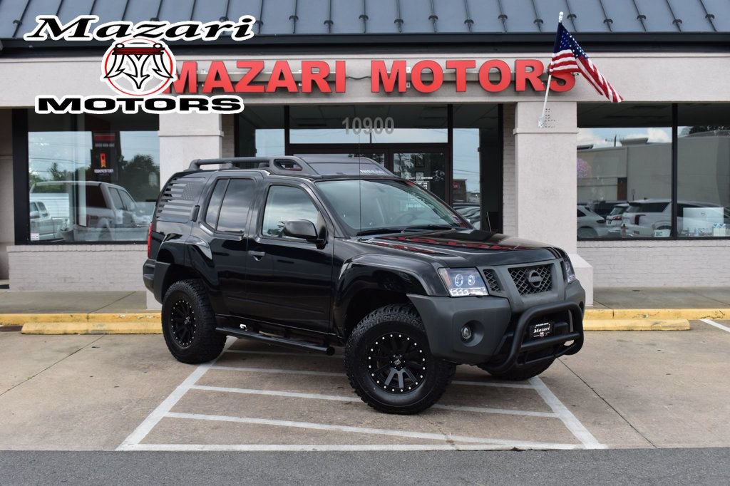 Used 2010 Nissan Xterra X AWD/4WD image 1