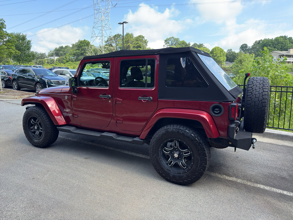 Used 2012 Jeep Wrangler Unlimited Sahara w/ Dual Top Group AWD/4WD image 2