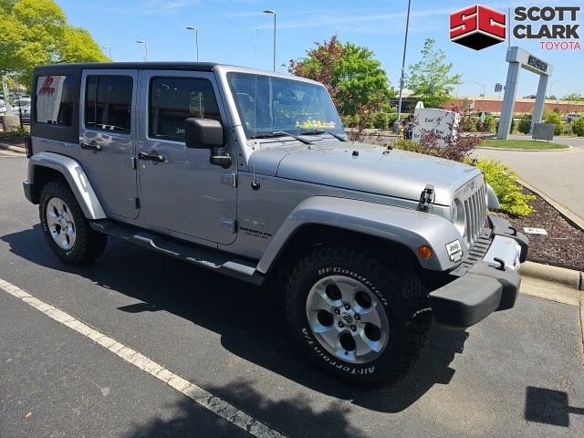 Used 2014 Jeep Wrangler Unlimited Sahara w/ Dual Top Group image 1