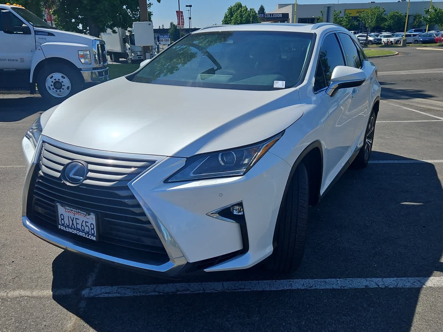 Used 2019 Lexus RX 450h AWD w/ Navigation Package image 1