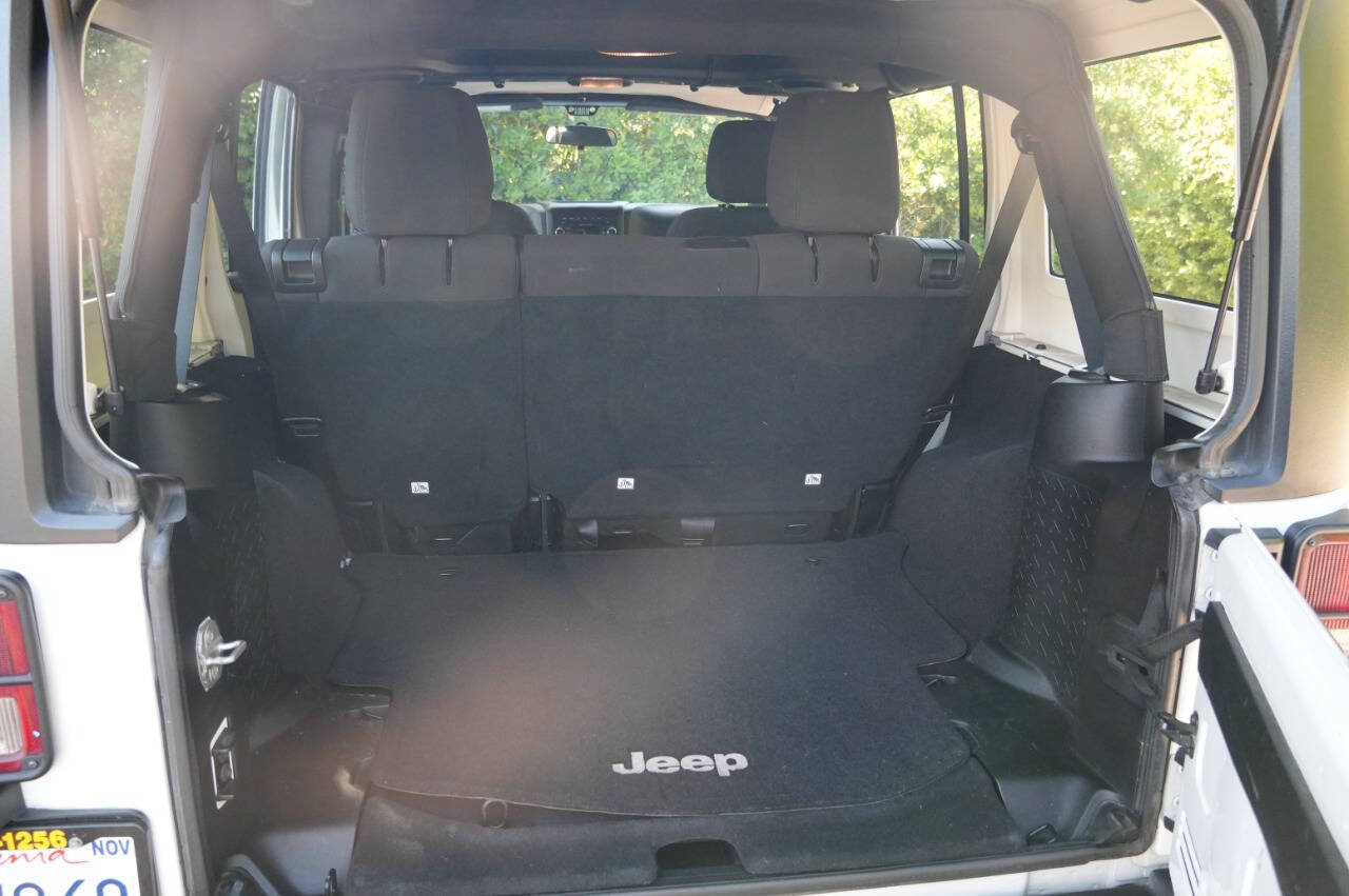 Used 2014 Jeep Wrangler Unlimited Sport w/ Mopar Black Appearance Group AWD/4WD image 21