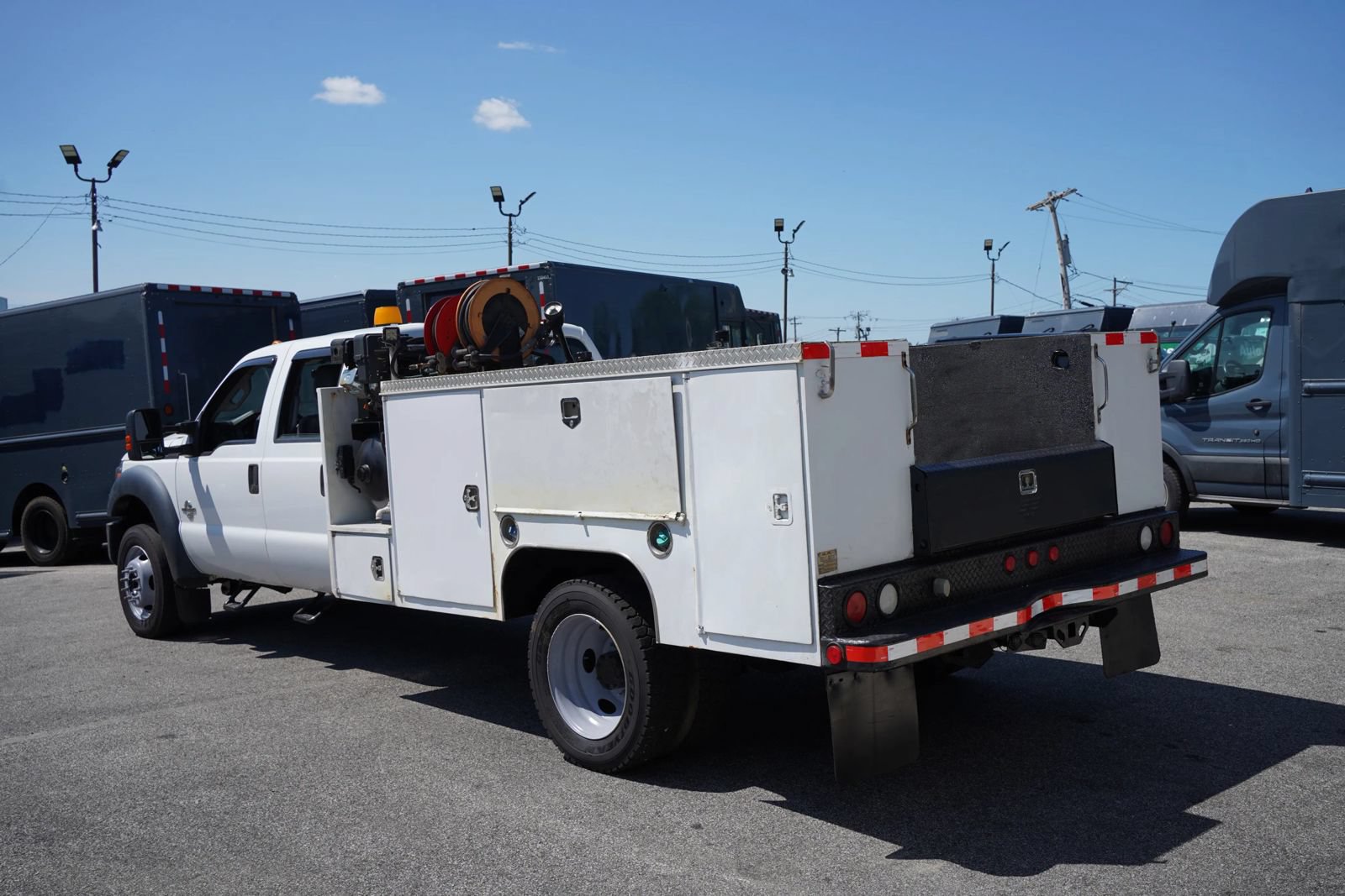 Used 2013 Ford F550 4x4 Crew Cab Super Duty w/ Payload Upgrade Pkg image 1