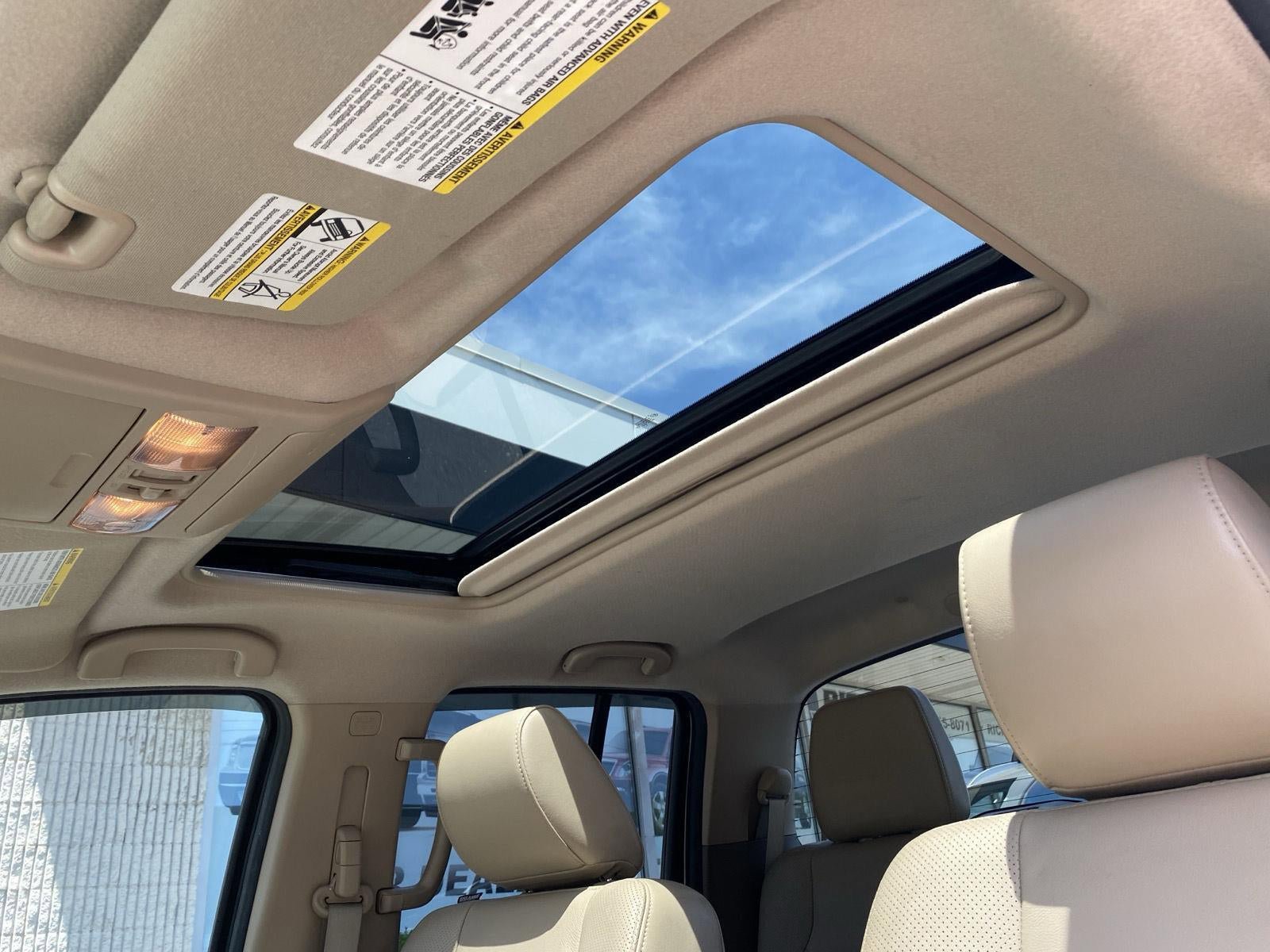 Used 2013 Nissan Frontier SL w/ Moonroof Pkg AWD/4WD image 37