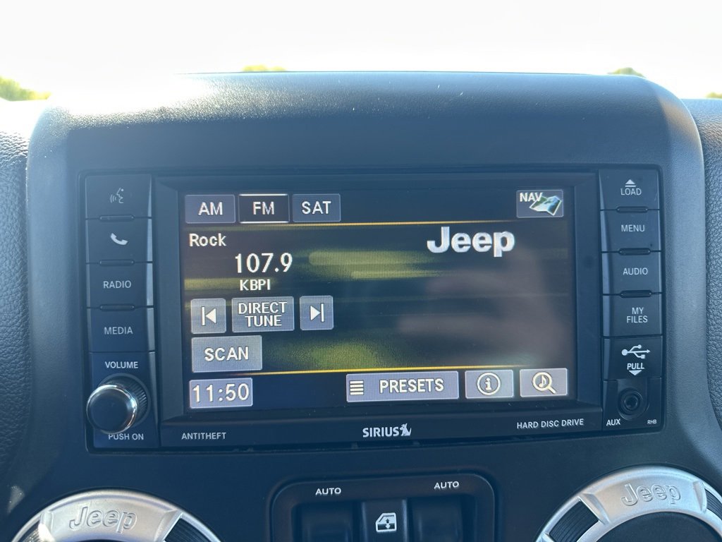 Used 2014 Jeep Wrangler Unlimited Sahara w/ Max Tow Package video 3