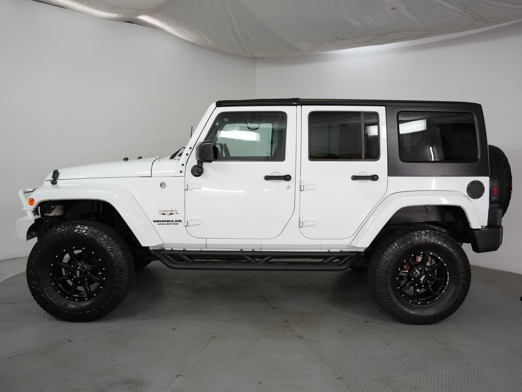 Used 2016 Jeep Wrangler Unlimited Sahara AWD/4WD image 4