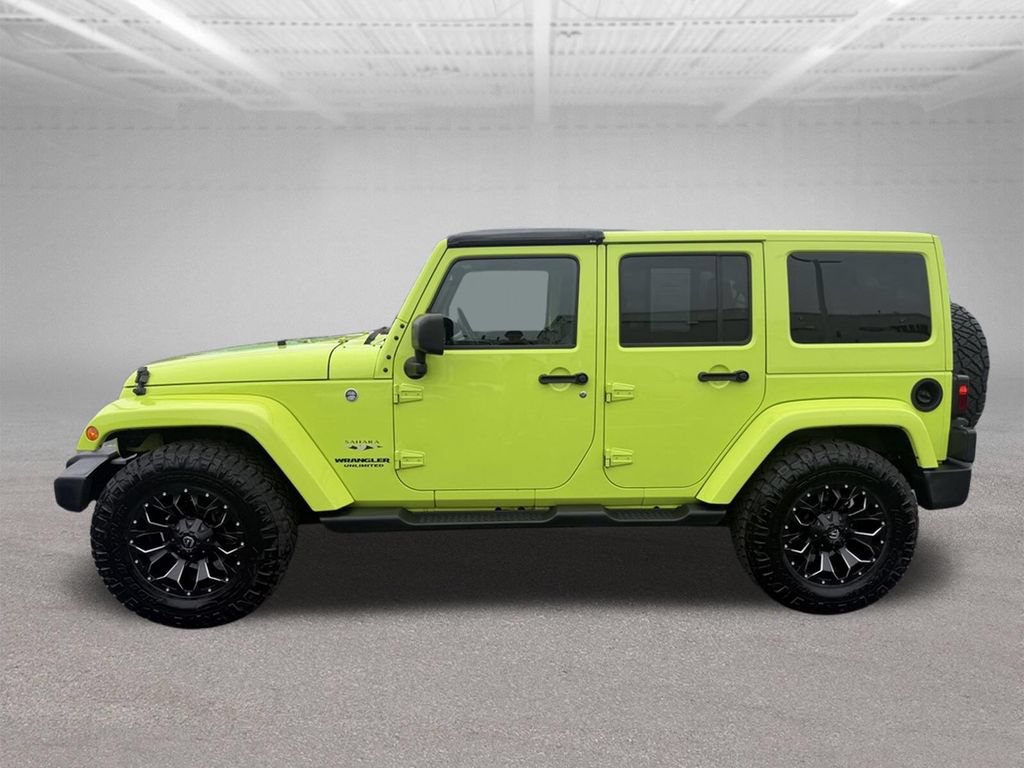 Used 2017 Jeep Wrangler Unlimited Sahara w/ Dual Top Group AWD/4WD image 12