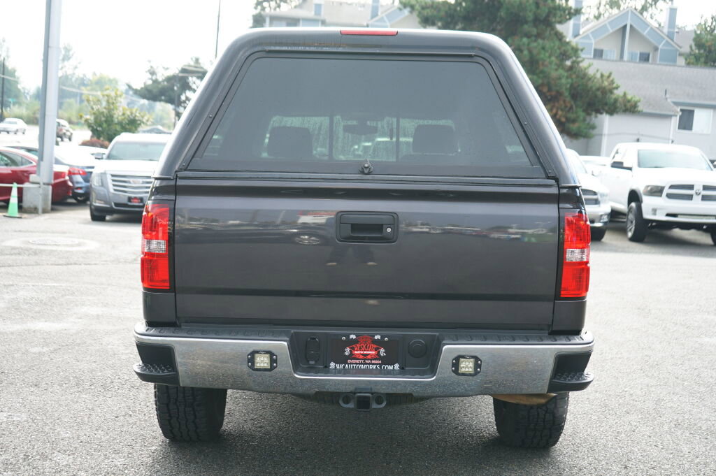 Used 2014 GMC Sierra 1500 SLE w/ Suspension Package, Off-Road image 4