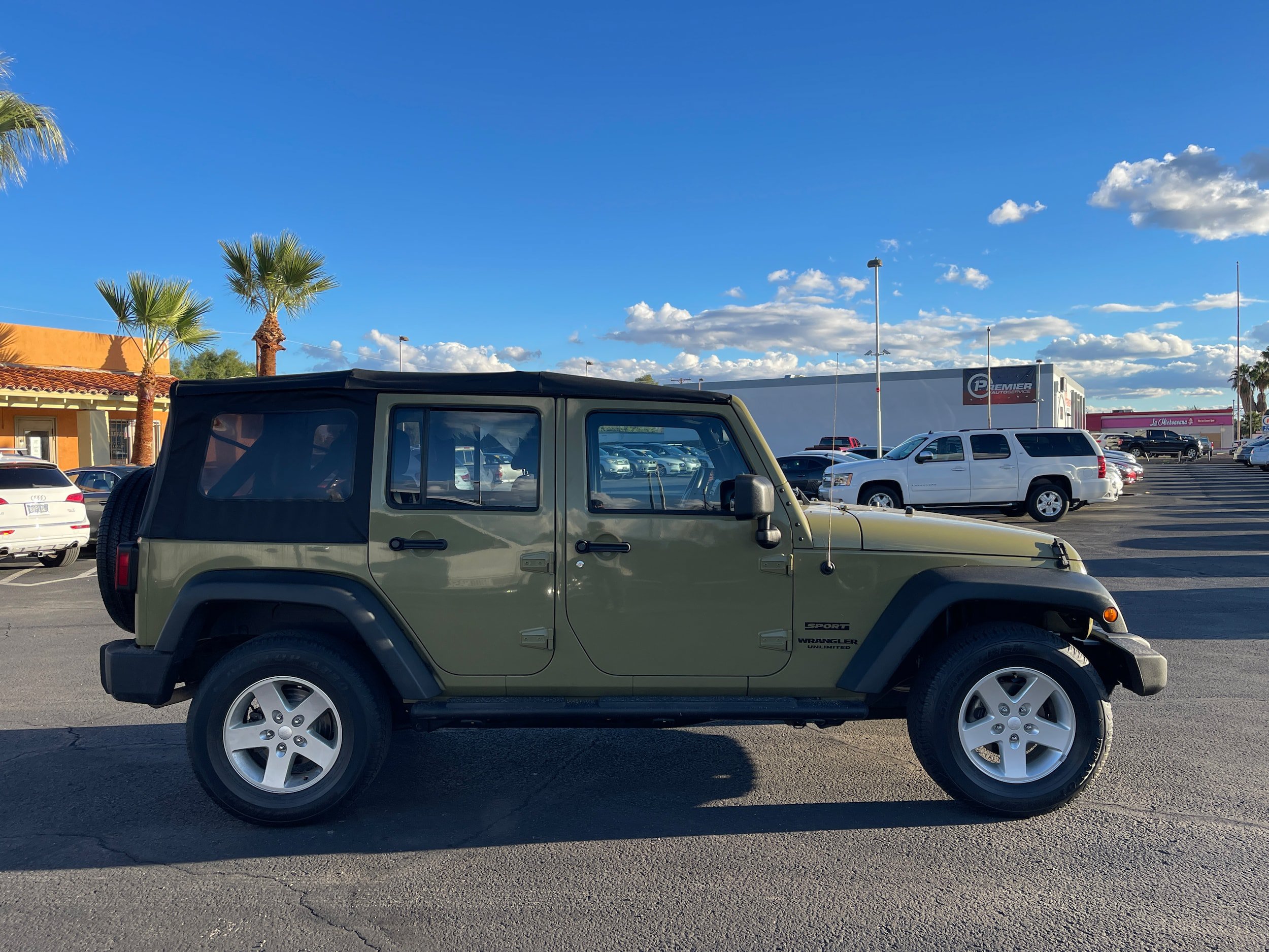 Used 2013 Jeep Wrangler Unlimited Sport w/ Mopar Black Appearance Group AWD/4WD image 6