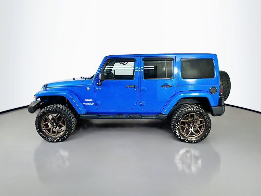 Used 2011 Jeep Wrangler Unlimited Sahara w/ Dual Top Group AWD/4WD image 4