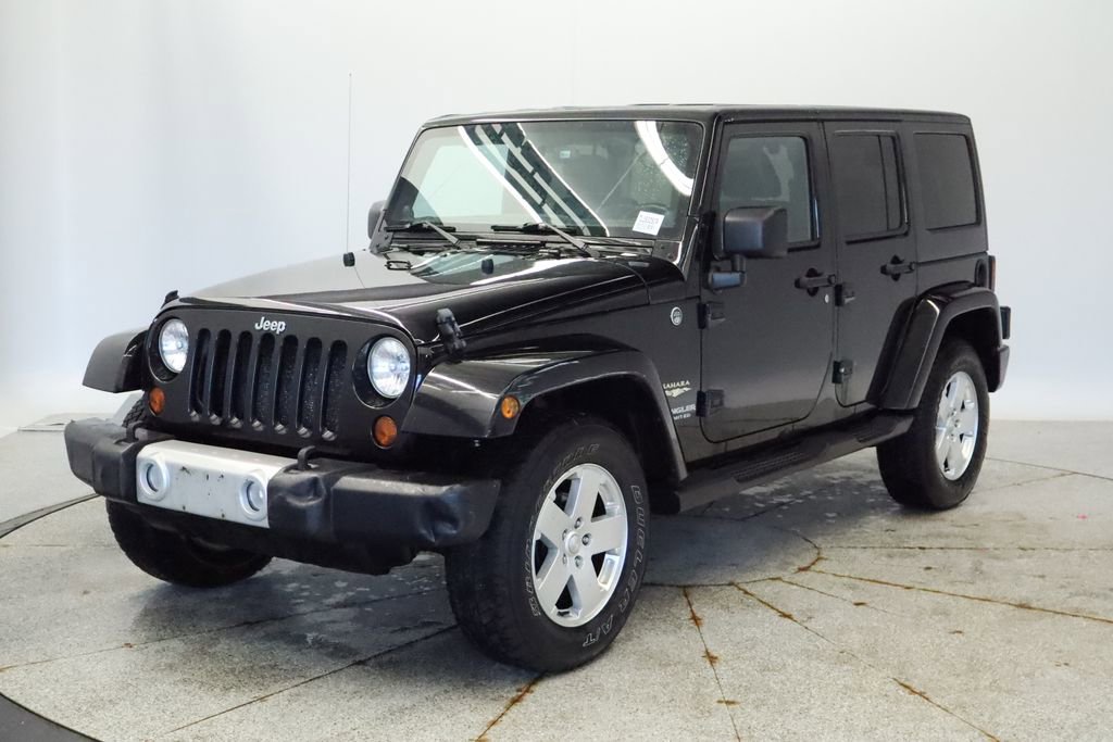 Used 2011 Jeep Wrangler Unlimited Sahara w/ Dual Top Group image 1