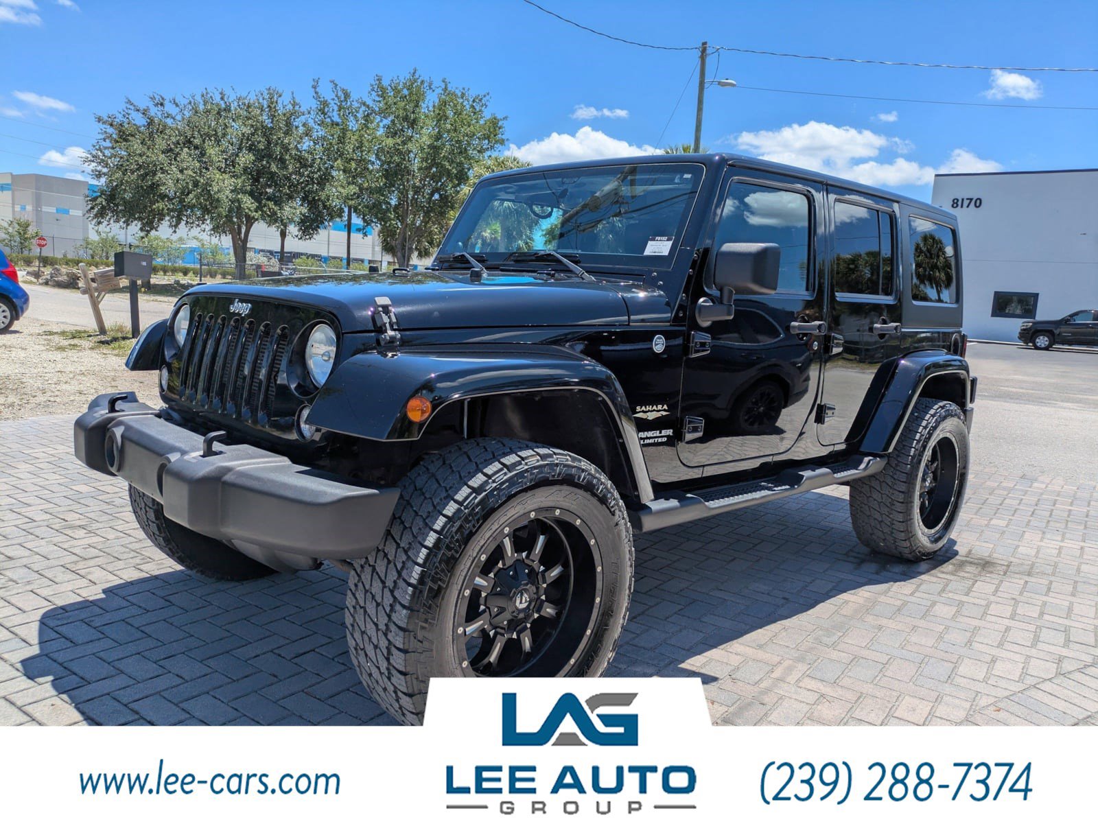 Used 2014 Jeep Wrangler Unlimited Sahara w/ Dual Top Group AWD/4WD image 6