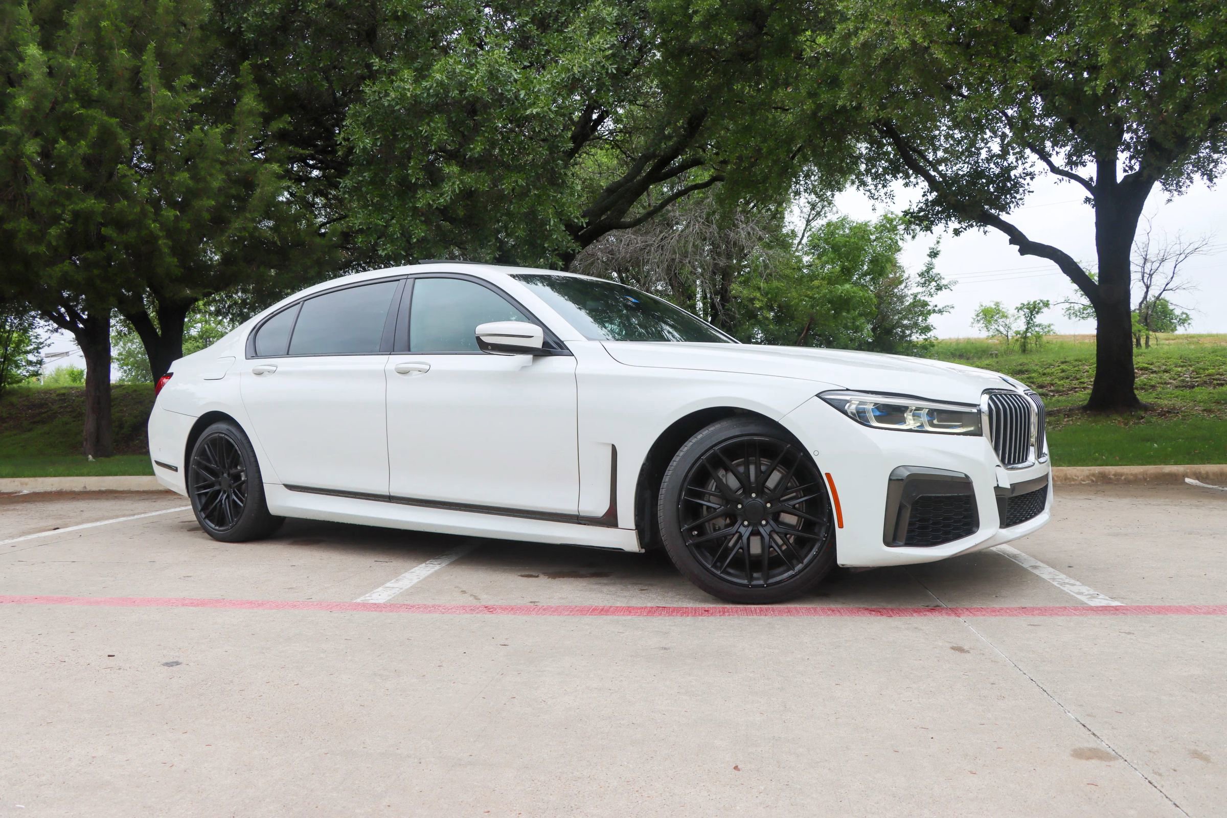 Used 2020 BMW 740i w/ M Sport Package RWD image 1