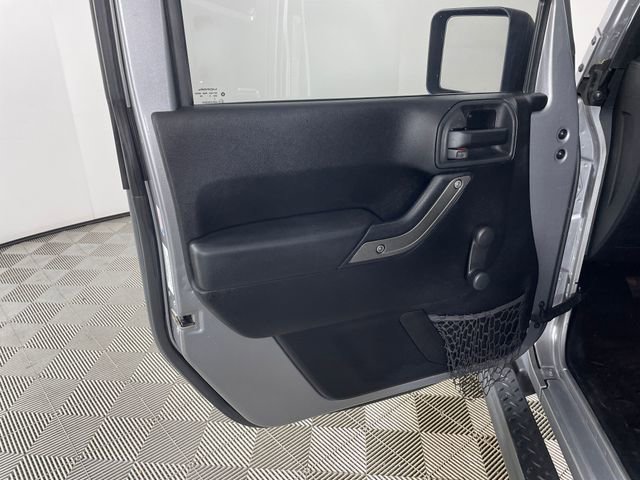 Used 2014 Jeep Wrangler Unlimited Sport w/ Mopar Black Appearance Group image 16