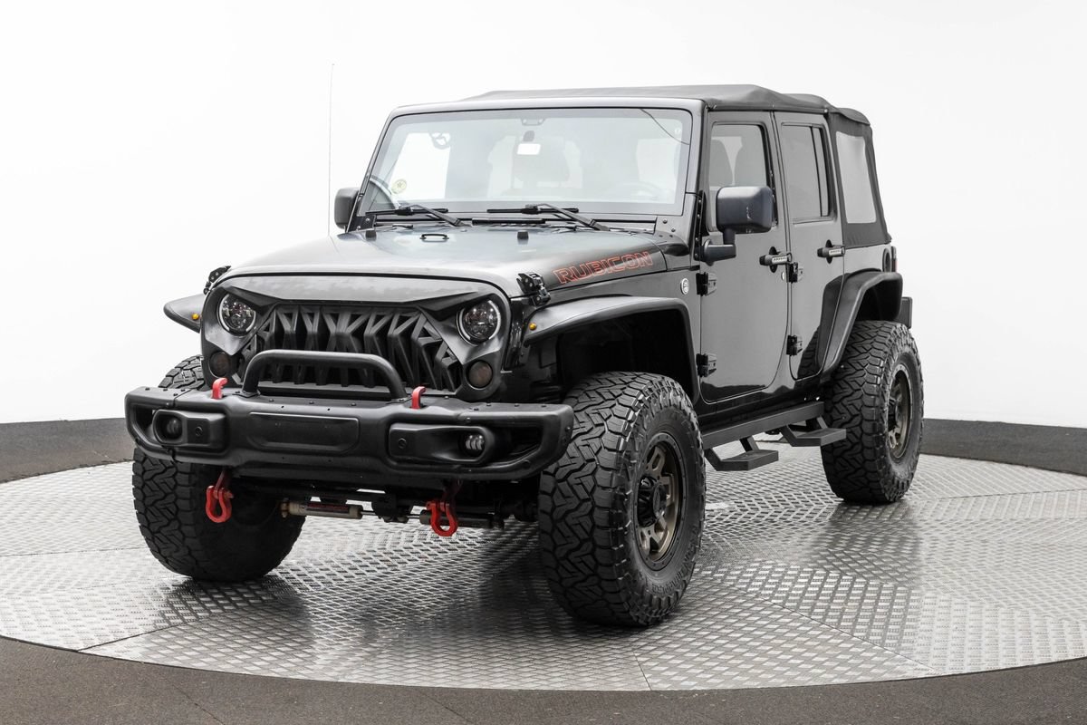 Used 2012 Jeep Wrangler Unlimited Rubicon w/ Dual Top Group AWD/4WD image 2