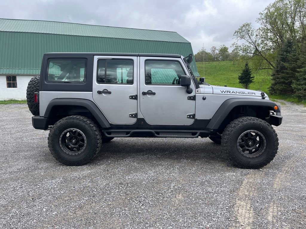 Used 2014 Jeep Wrangler Unlimited Sport w/ Connectivity Group AWD/4WD image 4