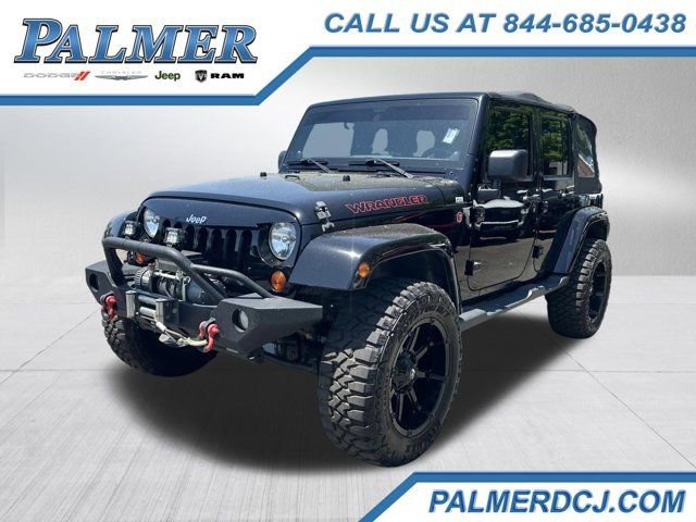 Used 2012 Jeep Wrangler Unlimited Sport AWD/4WD image 1