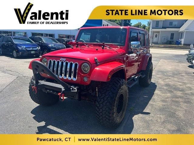 Used 2014 Jeep Wrangler Unlimited Sahara w/ Mopar Chrome Edition Group AWD/4WD image 1