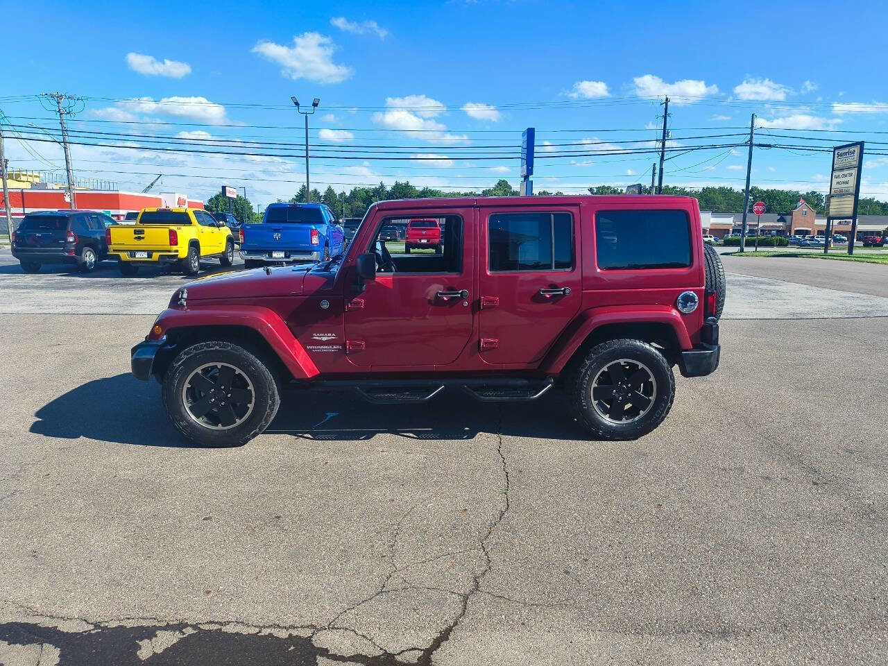 Used 2011 Jeep Wrangler Unlimited Sahara w/ Dual Top Group AWD/4WD image 11