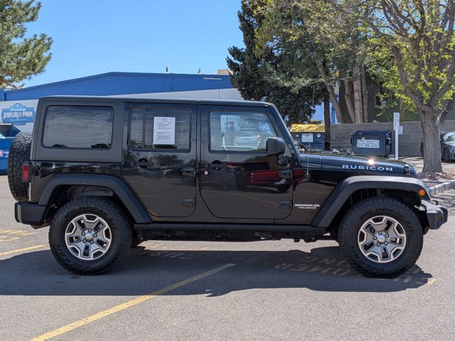 Used 2014 Jeep Wrangler Unlimited Rubicon w/ Dual Top Group video 4