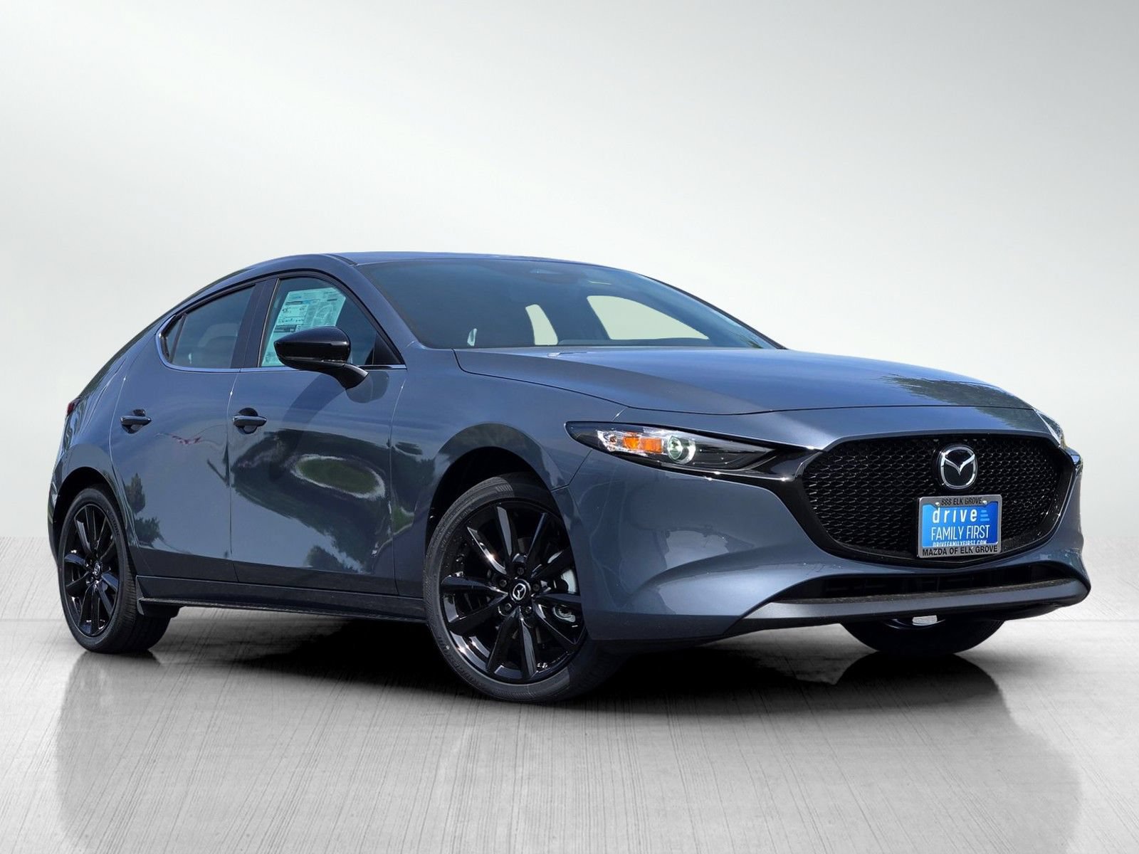 New 2026 MAZDA MAZDA3 Carbon AWD/4WD image 1