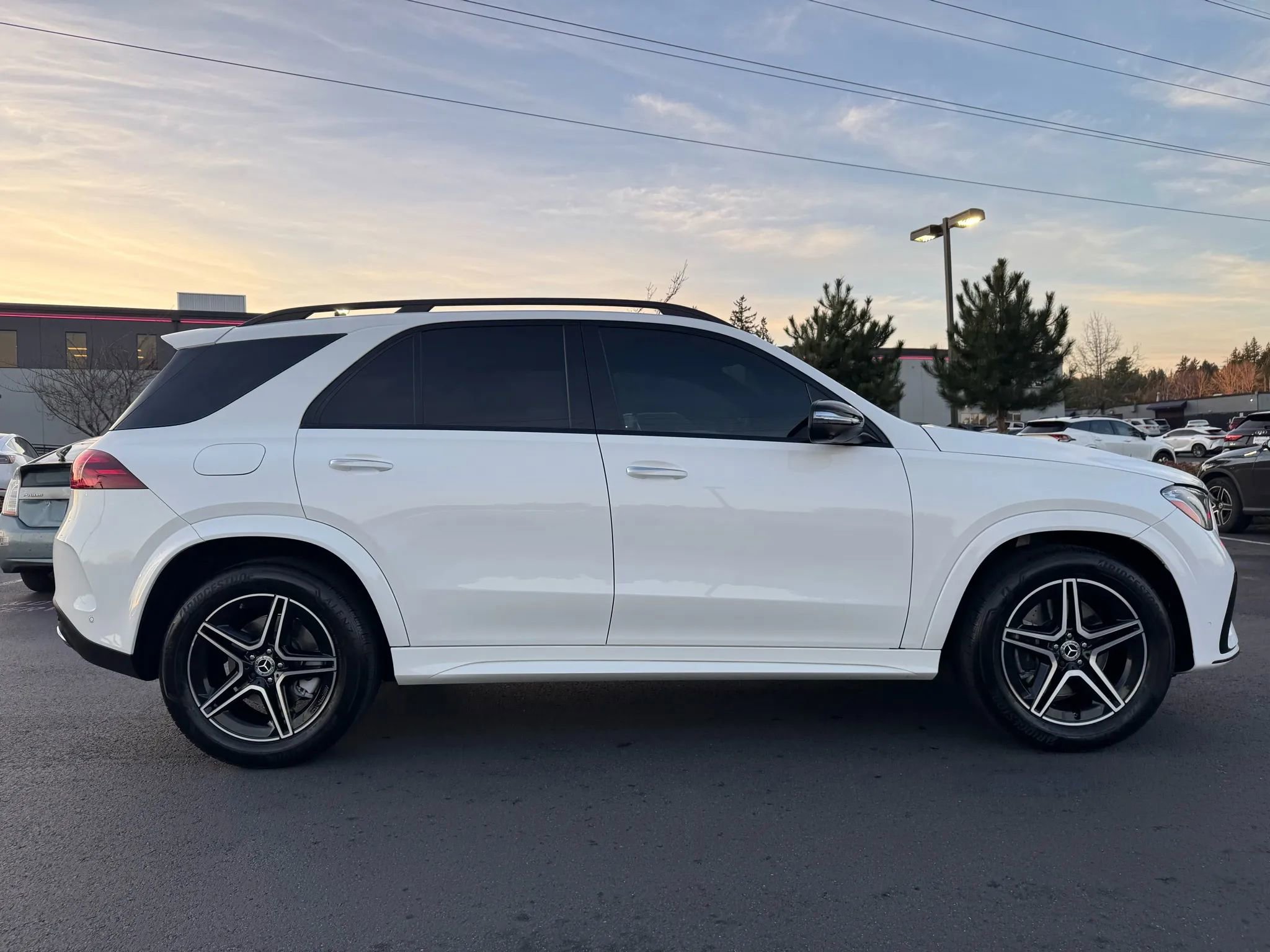 Used 2025 Mercedes-Benz GLE 450e 4MATIC w/ AMG Line Exterior image 12