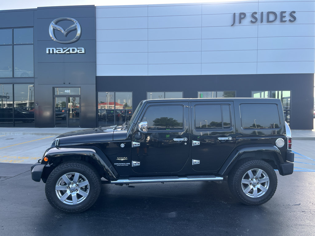 Used 2015 Jeep Wrangler Unlimited Sahara w/ Mopar Chrome Edition Group AWD/4WD video 2