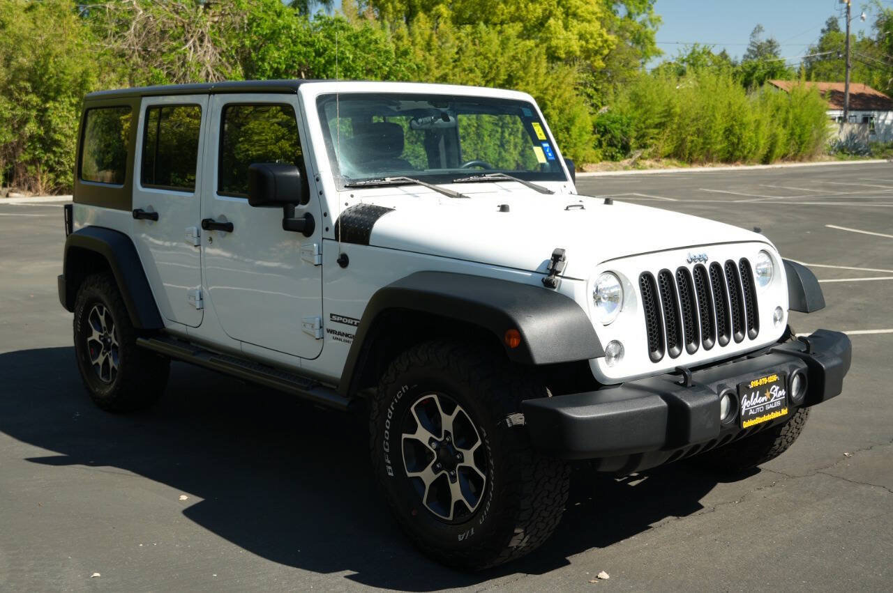 Used 2014 Jeep Wrangler Unlimited Sport w/ Mopar Black Appearance Group AWD/4WD image 8