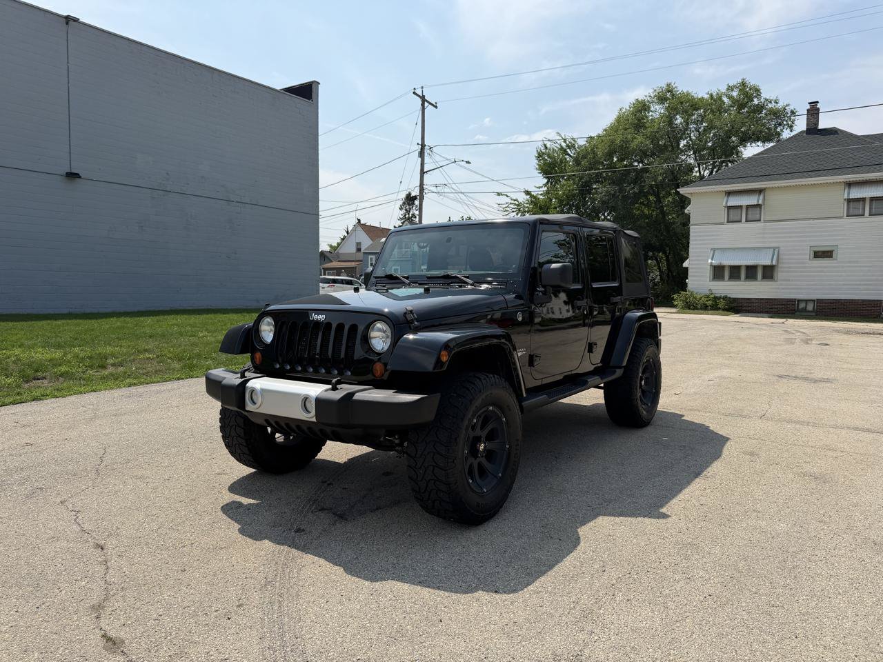 Used 2012 Jeep Wrangler Unlimited Sahara w/ Dual Top Group AWD/4WD image 3