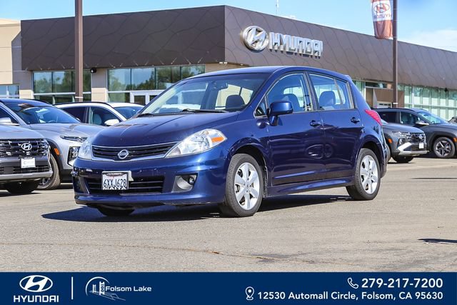 Used 2012 Nissan Versa Hatchback w/ SL Navigation Pkg FWD image 1
