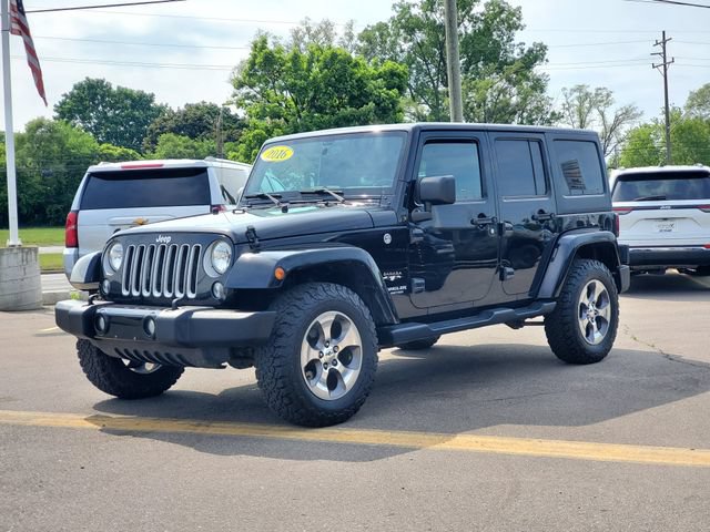 Used 2016 Jeep Wrangler Unlimited Sahara w/ Dual Top Group AWD/4WD image 28