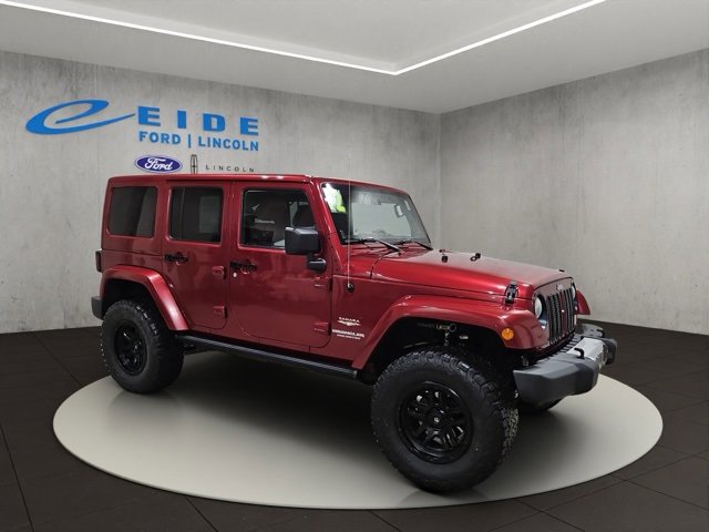 Used 2012 Jeep Wrangler Unlimited Sahara w/ Connectivity Group image 1