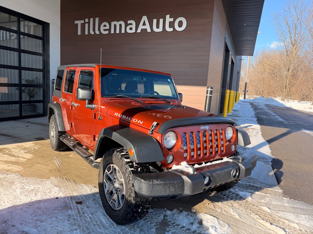 Used 2014 Jeep Wrangler Unlimited Rubicon w/ Dual Top Group AWD/4WD image 1