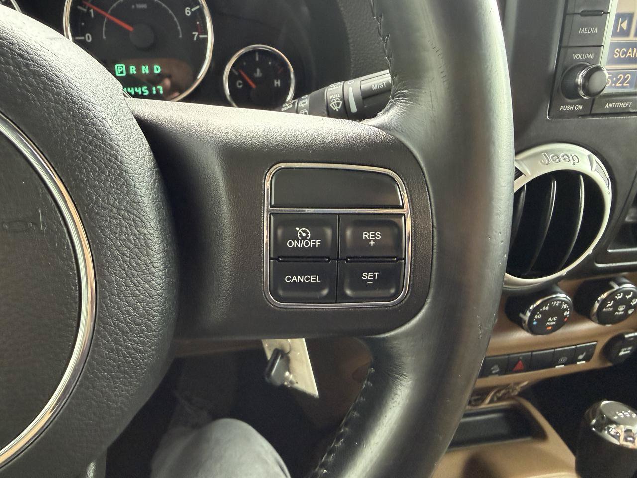 Used 2012 Jeep Wrangler Unlimited Sahara w/ Dual Top Group AWD/4WD image 26