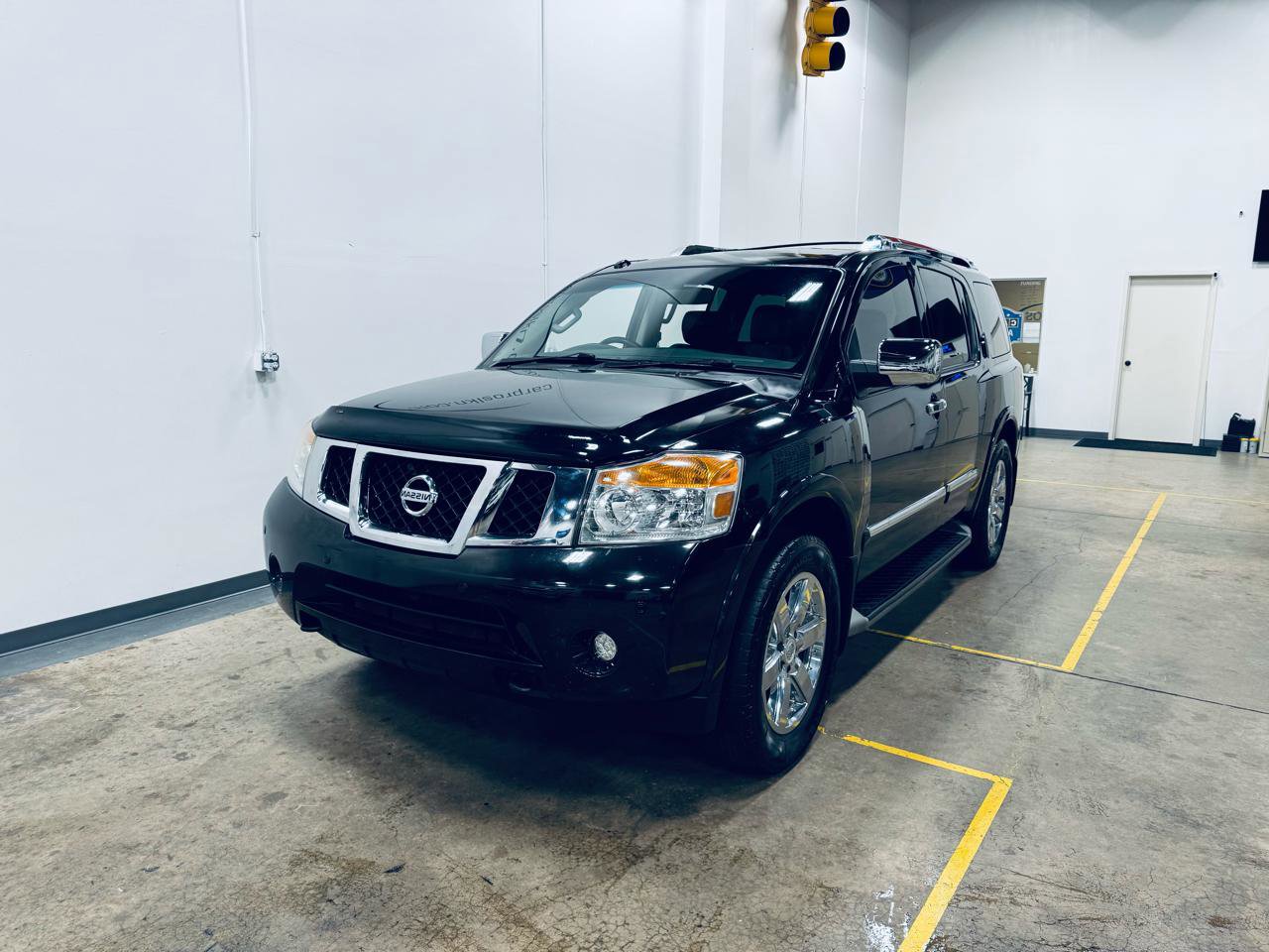 Used 2014 Nissan Armada Platinum w/ 2nd Row Captain Seat Package image 3