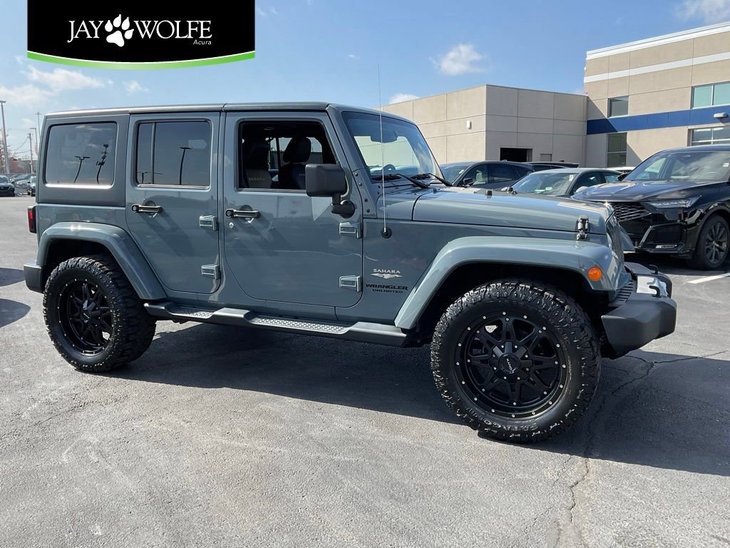 Used 2014 Jeep Wrangler Unlimited Sahara w/ Connectivity Group image 1