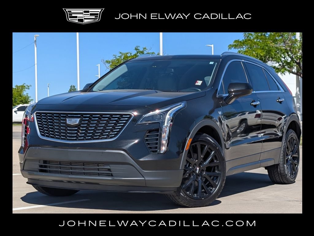 Used 2023 Cadillac XT4 Luxury w/ LPO, Onyx Lite Package AWD/4WD image 1