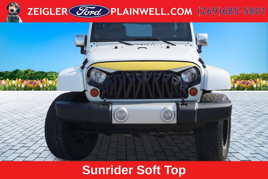 Used 2012 Jeep Wrangler Unlimited Sahara w/ Dual Top Group AWD/4WD image 8