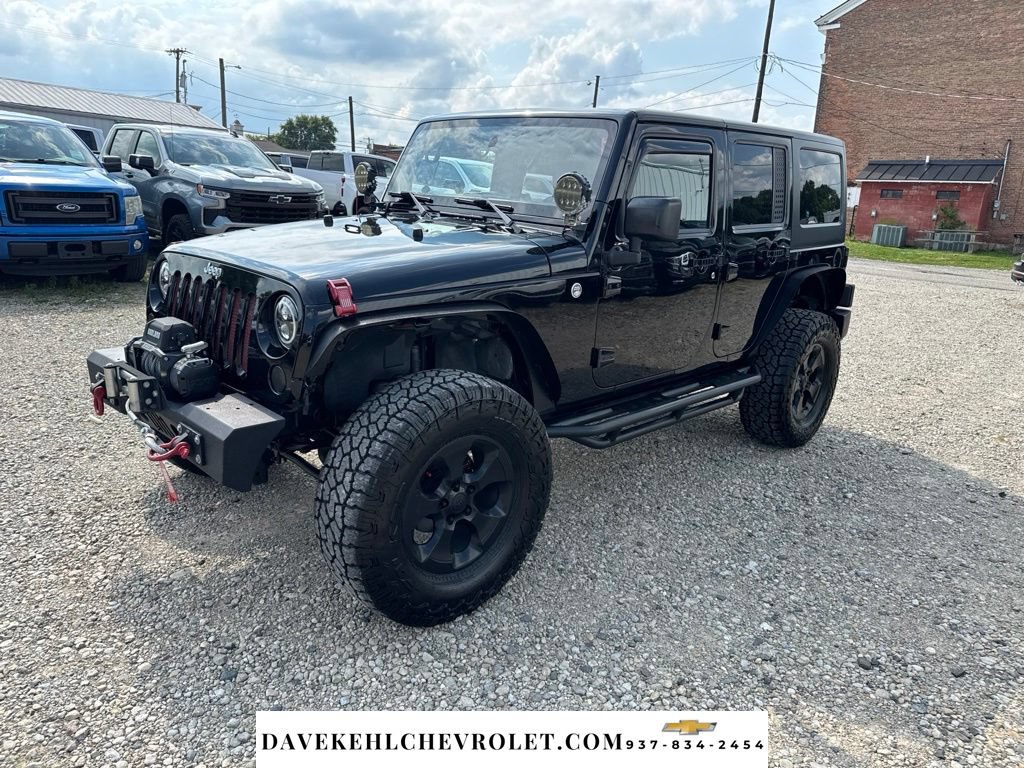 Used 2015 Jeep Wrangler Unlimited Sahara AWD/4WD image 1
