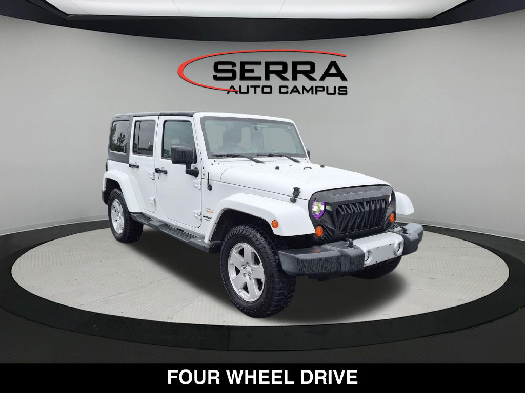 Used 2012 Jeep Wrangler Unlimited Sahara w/ Dual Top Group AWD/4WD image 13