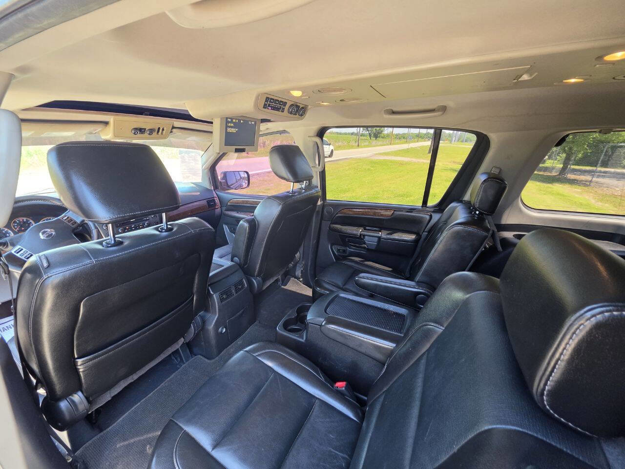Used 2011 Nissan Armada Platinum w/ 2nd Row Captain Seat Pkg AWD/4WD image 4
