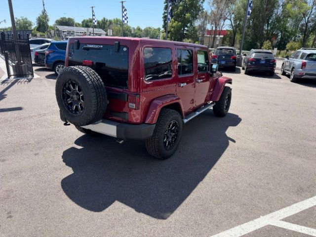 Used 2011 Jeep Wrangler Unlimited Sahara w/ Dual Top Group AWD/4WD image 11