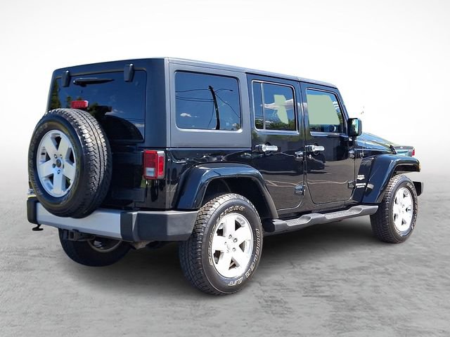 Used 2011 Jeep Wrangler Unlimited Sahara w/ Dual Top Group AWD/4WD image 6