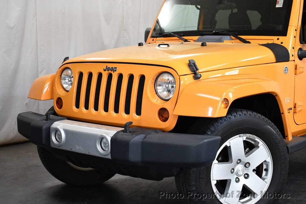 Used 2012 Jeep Wrangler Unlimited Sahara AWD/4WD image 2
