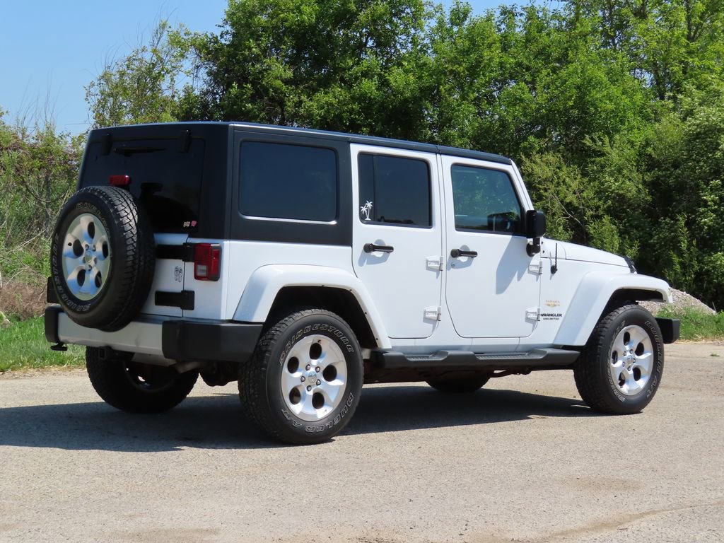 Used 2013 Jeep Wrangler Unlimited Sahara w/ Dual Top Group AWD/4WD image 3