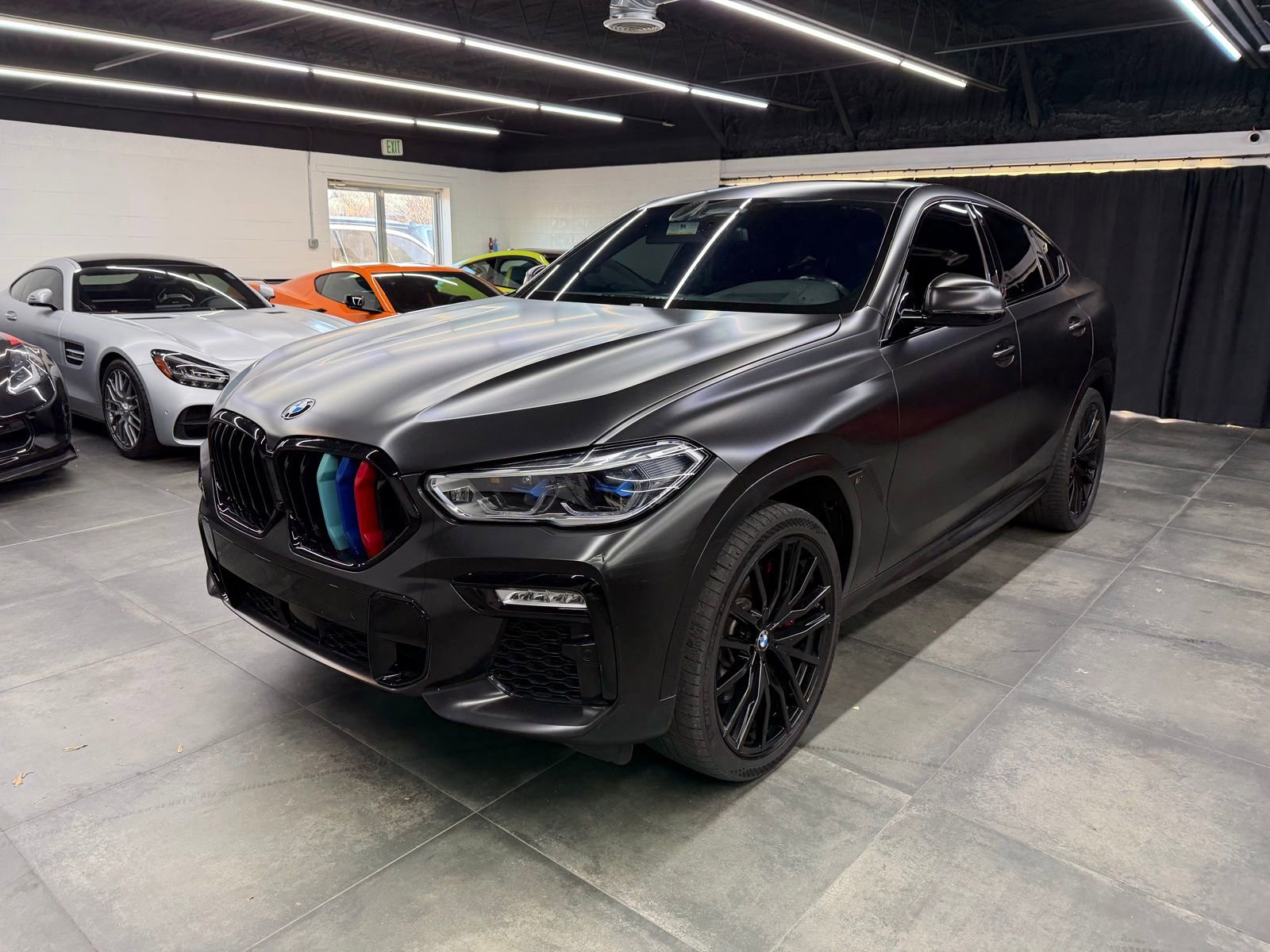 Used 2021 BMW X6 M50i w/ Executive Package image 1