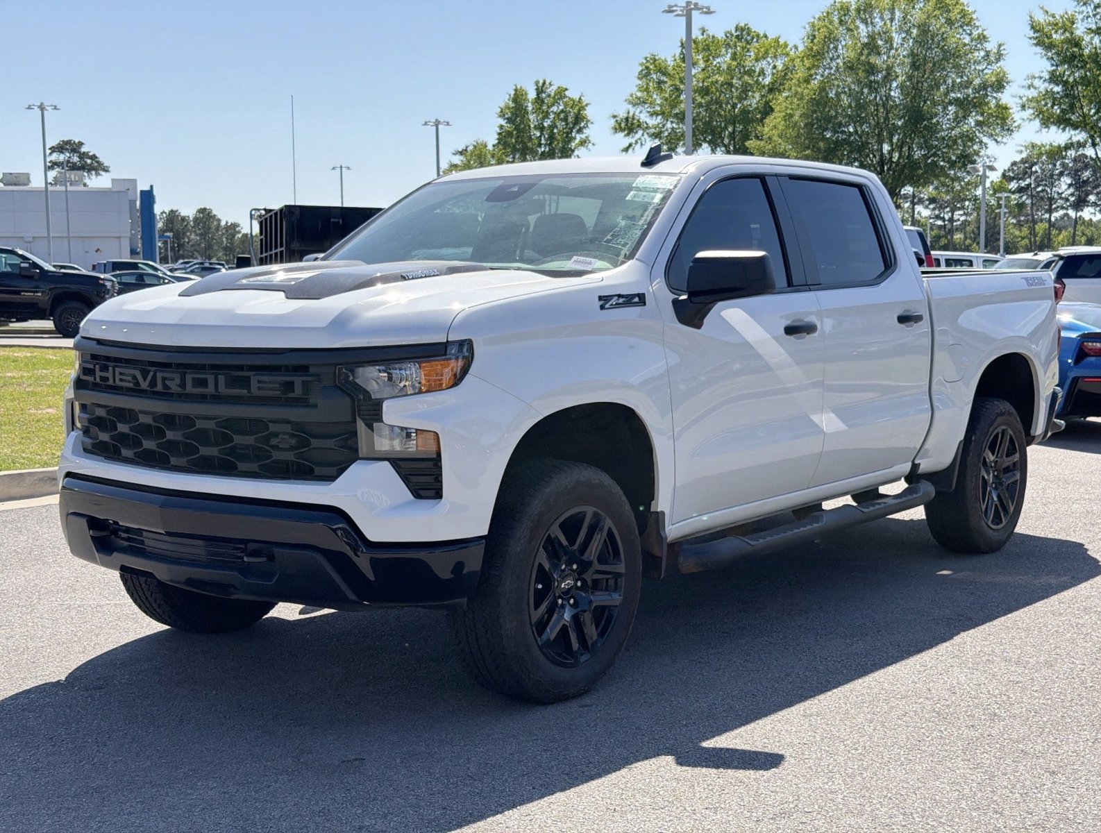 Used 2024 Chevrolet Silverado 1500 Custom Trail Boss w/ Turbomax Blackout Package AWD/4WD image 11