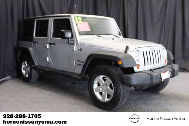 Used 2012 Jeep Wrangler Unlimited Sport AWD/4WD image 1