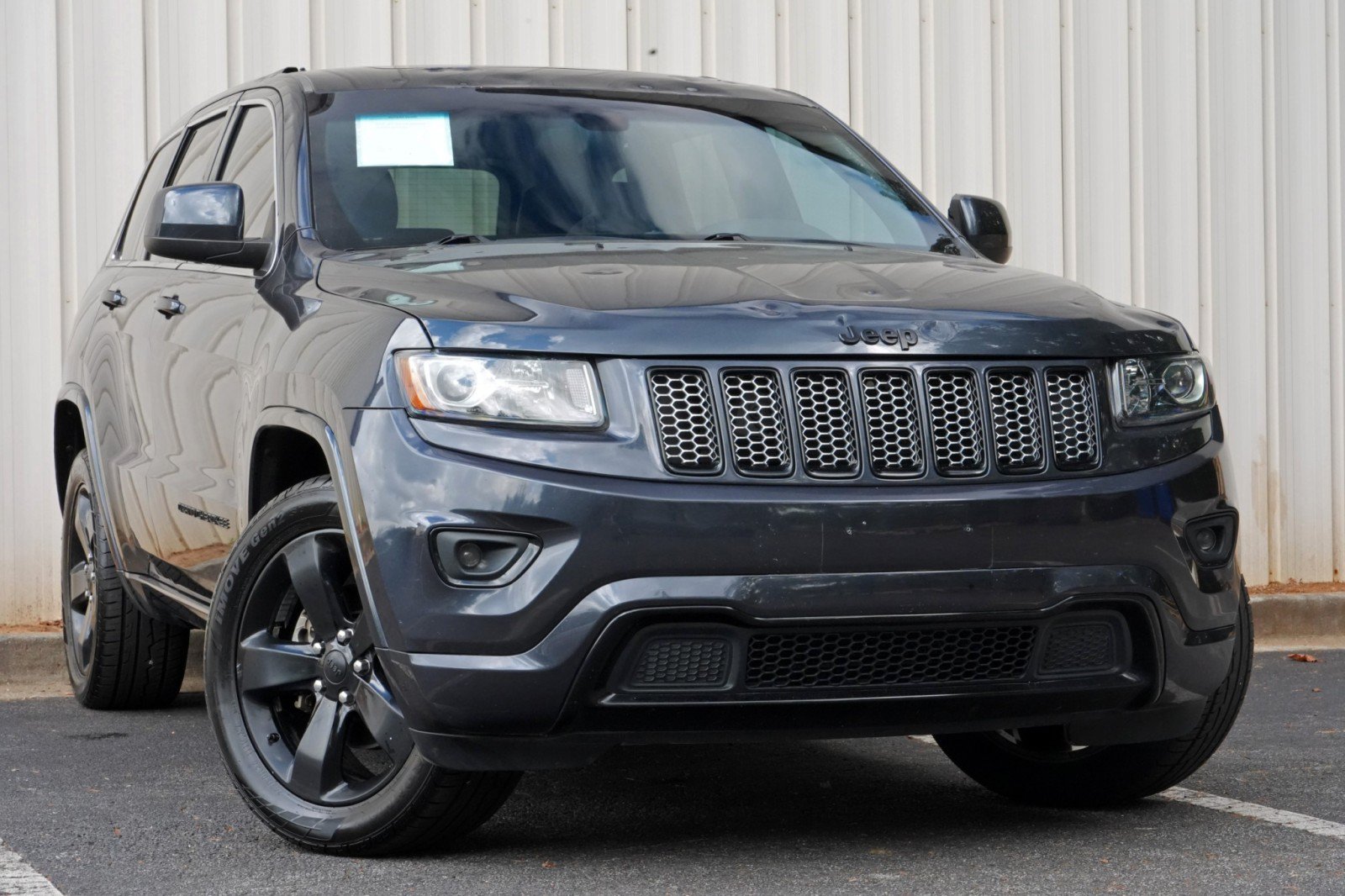 Used 2015 Jeep Grand Cherokee Altitude AWD/4WD image 2